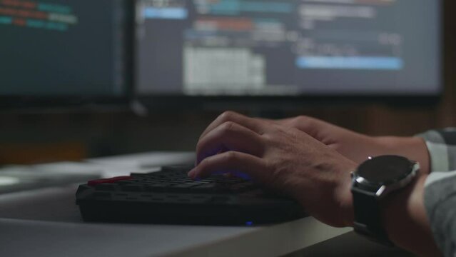 Close Up Of Male Programmer'S Hands Typing On Desktop Computer Creating Software Engineer Developing App, Program, Video Game At Home. Terminal With Coding Language 
