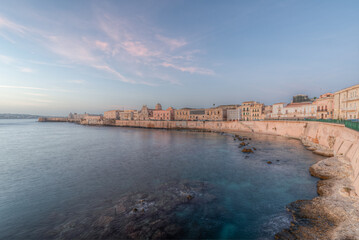 The breathtaking scenery of the Ortigia seafront in Syracuse Sicily in  the sunrise of a new day
