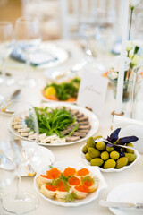 catering table with snacks and tapas