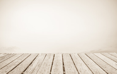 Wooden terrace the blurred and Christmas background concept. Wood white table top perspective in front of natural in the sky.