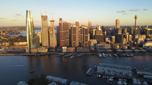 Aerial drone view of Barangaroo waterfront precinct in Sydney City, NSW during a sunny late afternoon in January 2023 