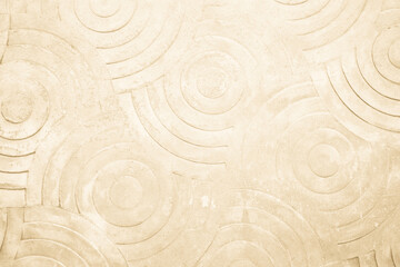 Fototapeta na wymiar Cream concrete texture wall background. Abstract beige paint floor stamped concrete surface clean polished on walkway in garden. Wallpaper pattern curved circle rough brown cement stone decorative.