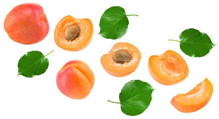 flying cut of apricot fruit with green leaf isolated on white background. clipping path