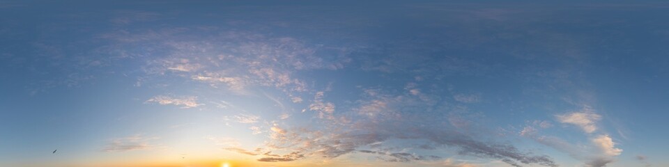 Dark blue sunset sky panorama with pink Cirrus clouds. Seamless hdr 360 panorama in spherical equirectangular format. Full zenith for 3D visualization, sky replacement for aerial drone panoramas.