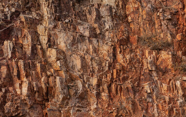 Abstract rock stone background with wall of red mountain texture