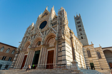 Siena, Italy. Beautifully ornate Dome facade - obrazy, fototapety, plakaty