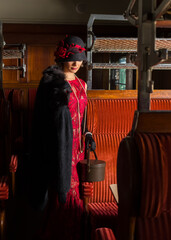 1920s woman in first class compartment
