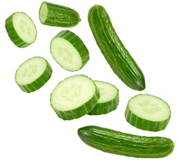 flying cucumbers with slices isolated on white background. clipping path