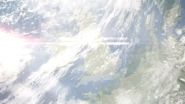 Earth zoom in from outer space to city. Zooming on St. Helens, UK. The animation continues by zoom out through clouds and atmosphere into space. Images from NASA