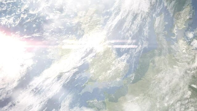 Earth zoom in from outer space to city. Zooming on Wigan, UK The animation continues by zoom out through clouds and atmosphere into space. Images from NASA
