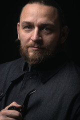 stylish man in retro outfit suit hat smoking wooden pipe sherlock holmes look cosplay england gentleman fashionable confident gangster Guy Ritchie Charlie Hunnam style