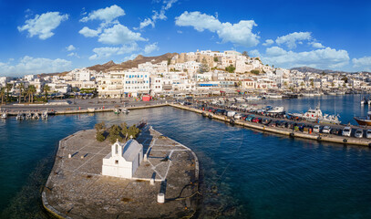 Panoramic view of the town at Naxos island, Cyclades, Greece, with the little church of Mirtidotisa...