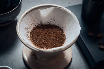 Obraz na płótnie Canvas coffee powder in the dripper for make coffee