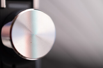 Closeup of metallic volume knob
