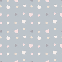 Seamless vector pattern of hearts on a light gray pastel background