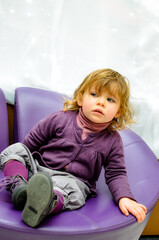 Fototapeta premium Pretty little girl looking intrigued or worried