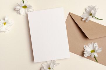Invntation or greeting card mockup with envelope and flowers