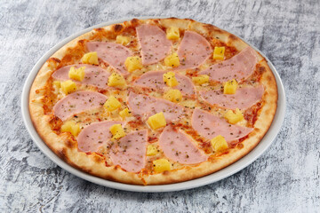 fresh pizza on the white plate