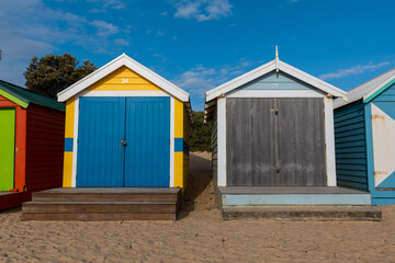 Blue and yellow bathing boxes at Brighton Beach, Melbourne, Australia.