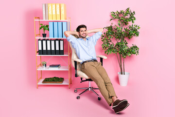 Full length photo of positive guy hr recruiter sit comfort chair hand hold behind head wait...