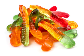 Heap juicy colorful jelly worms sweets. Gummy candies. Snakes. On white