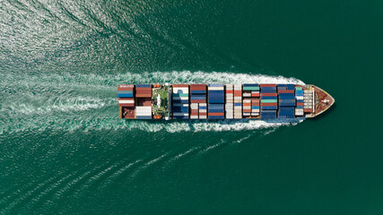 Fototapeta premium container cargo ship, import export commerce business and industry service logistic transportation International by container cargo ship in open sea, shipping logistic transport global 