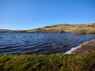 From the northern shore of Semerwater, looking north west towards Green Scar Mire Crag. Raydale. North Yorkshire