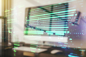 Abstract creative world map on modern laptop background, international trading concept. Multiexposure