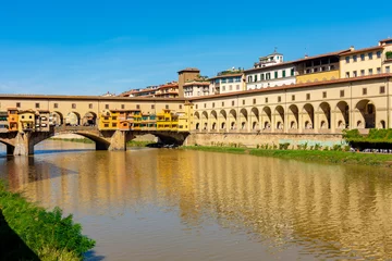 Gartenposter Ponte Vecchio bridge and Vasari corridor over Arno river in Florence, Italy © Mistervlad