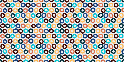 Abstract colored donut circles. Texture of identical geometric rings, seamless pattern. Vector print for wallpaper or seamless surfaces.