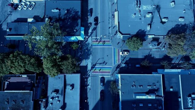 Davie Street Rainbow crosswalk top Birds eye view summer sunny people light traffic crossing Bute Jim Deva Plaza Hamburger Mary's QMUNITY BC Queer Trans and Two-Spirit Resource Centre