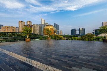 Empty floor and modern city skyline with modern building in Hangzhou, China.