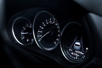 The speedometer has white lights and a black background that can be clearly seen.
Numbers indicate...