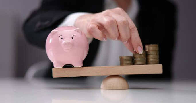 Piggybank And Stacked Coins Balancing