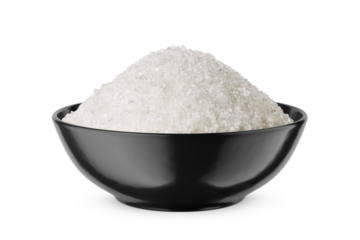 Crystal sugar in round black bowl isolated on white. Front view.