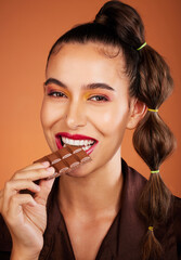 Chocolate, beauty and portrait girl eating sugar candy, sweets or dark chocolate dessert for stress relief. Skincare, facial cosmetics makeup and model woman face with cacao product for antioxidants