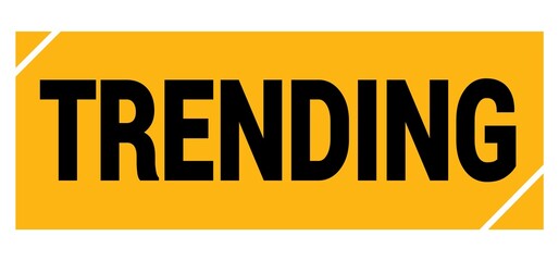 TRENDING text on yellow-black grungy stamp sign.