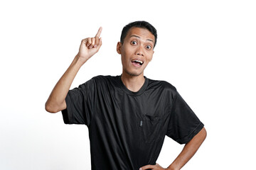 Asian man wearing black training t-shirt, Gesture thinking or getting idea. Isolated by white background