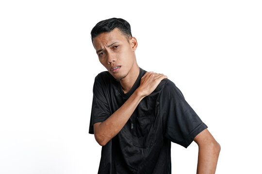 Asian men wearing black training shirts, with tired, achy, tired and lethargic body gestures. Isolated by white background