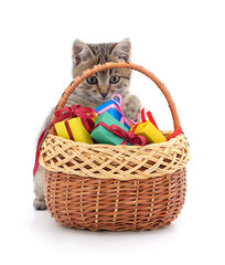 Fototapeta na wymiar Kitten and basket with gifts.