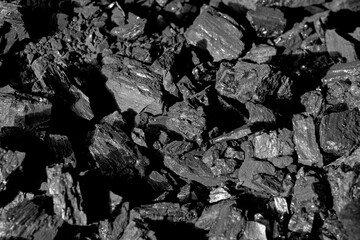 Close-up of black coal stones. fuels and minerals..