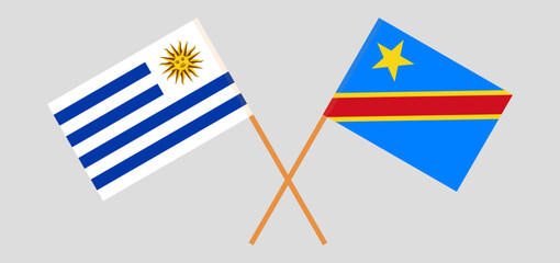Crossed flags of Uruguay and Democratic Republic of the Congo. Official colors. Correct proportion