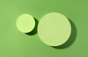 Green scene for product presentation, green stage made with round shapes. Studio photography.