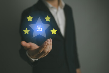 businessman are rating the highest 5 stars satisfaction from customers who use appraisal services through online applications. business, online application, service concept..