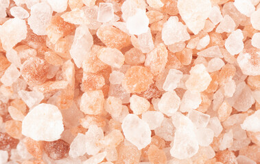Full frame close up of pink himalayan salt as abstract background.