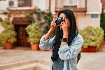 Asian female tourist student on city streets