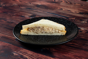 Fresh club sandwich filled with chicken and mayo dip isolated on table top view of indian food