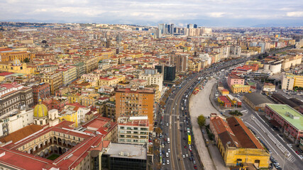 Aerial view of Marina street in Naples, Italy. This is one of the main roads in city traffic. In the background is the business center of the city.