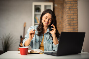 Pregnant woman in office. Beautiful businesswoman enjoy in fresh coffee..