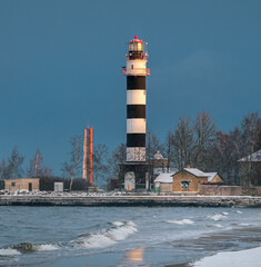 Frosty winter morning at Baltic sea shore in Riga. Beautiful landscape of seaside covered in snow...
